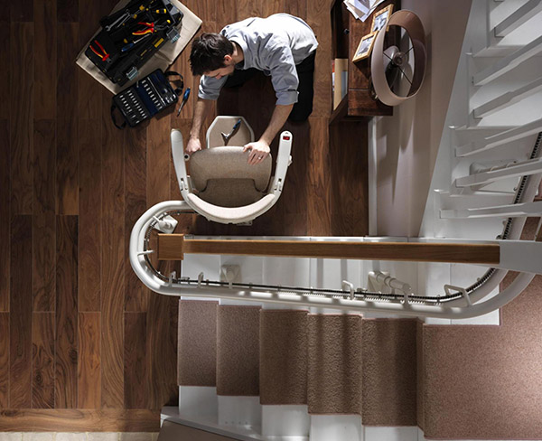 Dolphin curved stairlift — Handicare 2000 curved-rail lift serviced in Galway